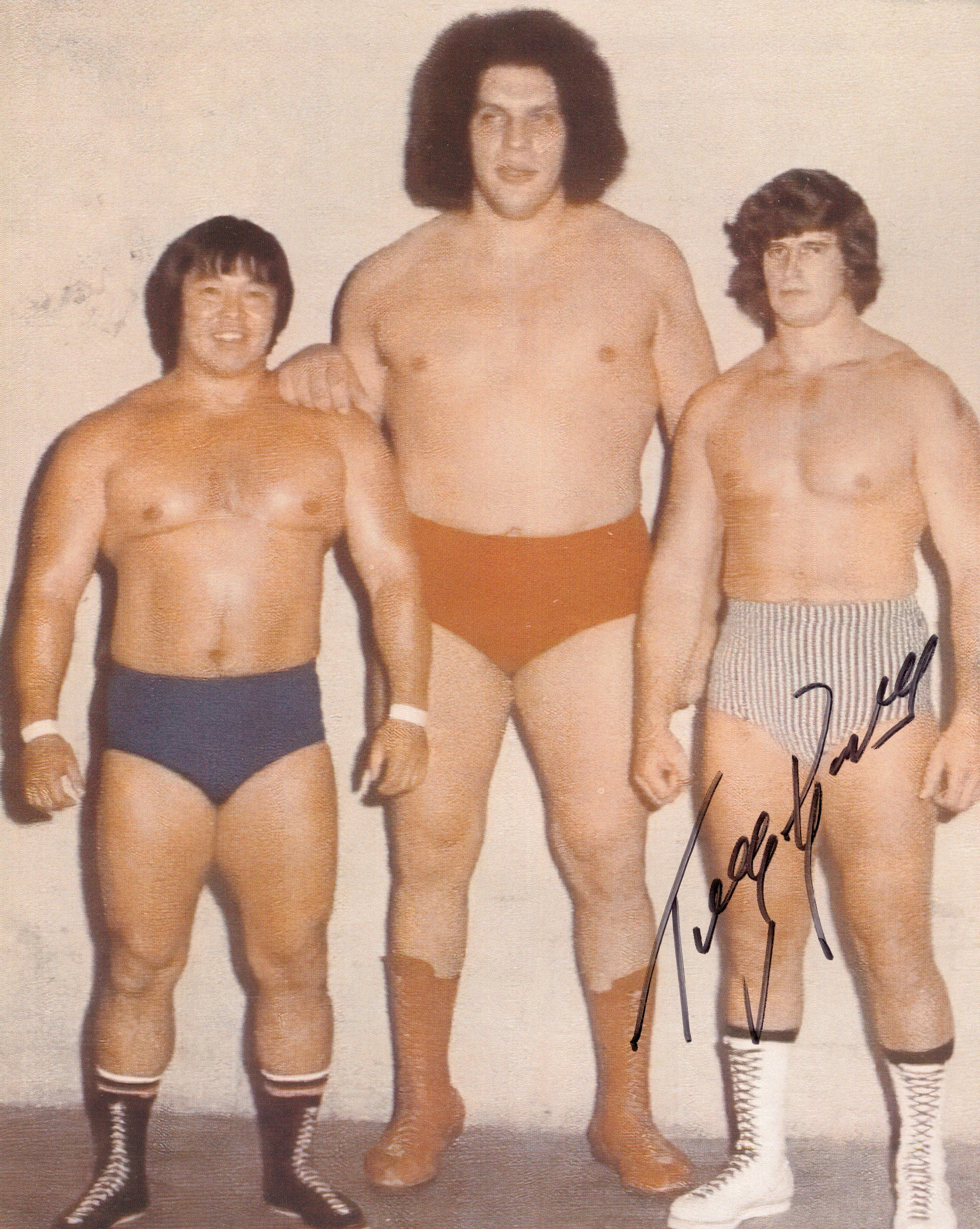 Rick selling Martel & Tony Garea autographed 8x10 photo