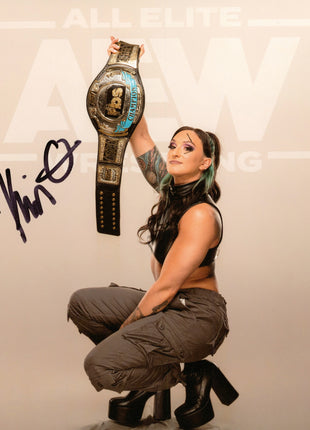 Kris Statlander firmó foto 8x10