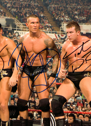 Randy Orton, Ted DiBiase Jr & Cody Rhodes triple signed 8x10 Photo (w/ PSA)