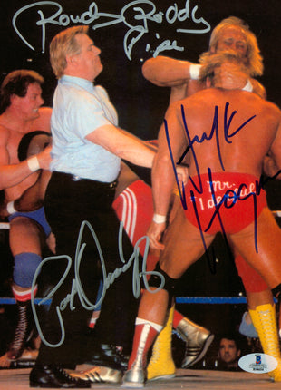 Hulk Hogan, Paul Orndorff & Rowdy Roddy Piper triple signed 8x10 Photo (w/ Beckett)