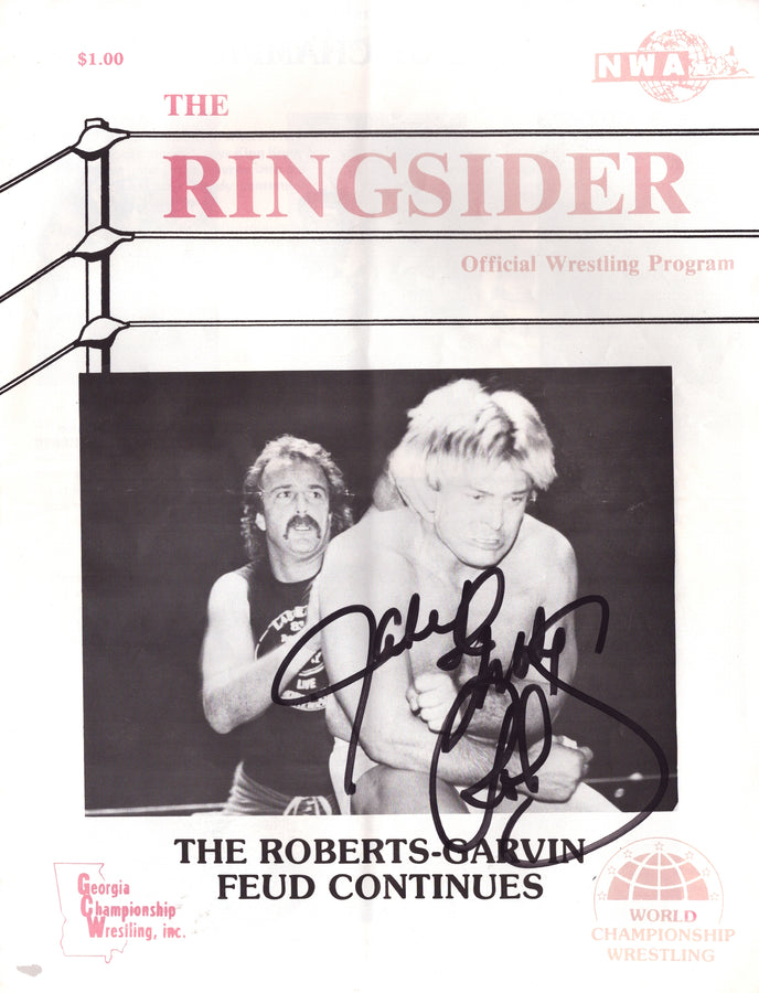 Jake Roberts signed The Ringsider Program – Signed By Superstars