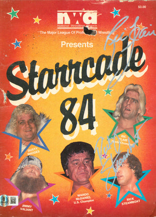 Ric Flair & Ricky Steamboat dual signed NWA Starrcade 84 Program (w/ Beckett)