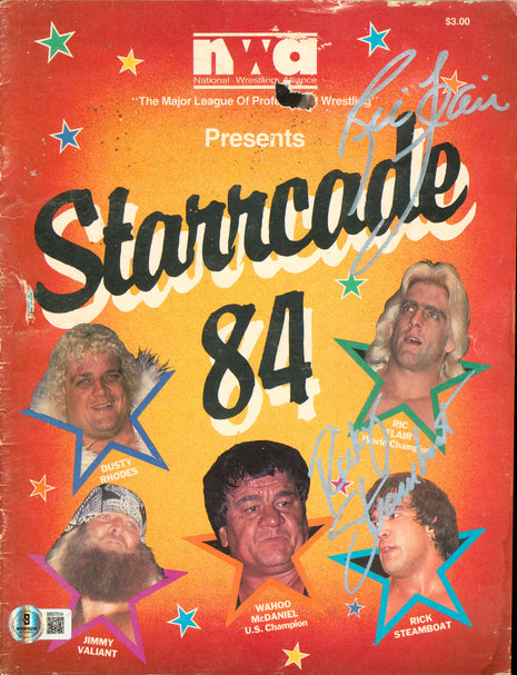 Ric Flair & Ricky Steamboat dual signed NWA Starrcade 84 Program (w/ Beckett)