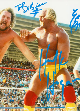 Hulk Hogan, Ted DiBiase, & Earl Hebner triple signed 8x10 Photo (w/ JSA)