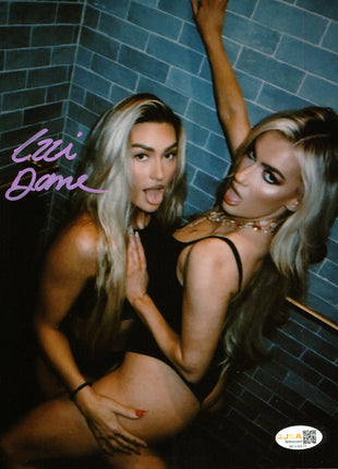 Izzi Dame signed 8x10 Photo (w/ JSA)
