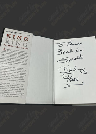 Harley Race signed King of the Ring Book (To Thomas)