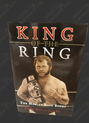 Harley Race signed King of the Ring Book (To Thomas)
