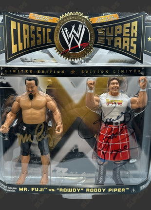 Rowdy Roddy Piper & Mr Fuji dual signed WWE Jakks Classic Superstars Action Figure 2-pack