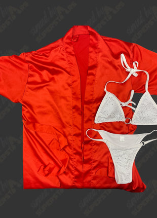 Subasta: Túnica roja usada por Francine en el ring de la WWE ECW y bikini blanco