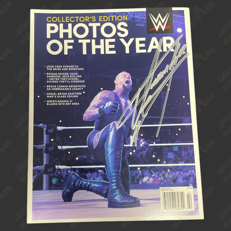 Auction:  Undertaker signed WWE Photos of the Year Magazine