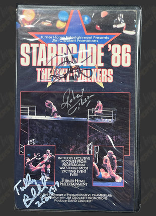 Dusty Rhodes, Ole Anderson, Robert Gibson & Tully Blanchard multi-signed Starrcade 86 VHS Tape