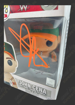 John Cena signed WWE Funko POP Figure #01 *Minor Damage* (Green Hat w/ JSA)