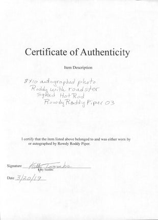 Rowdy Roddy Piper signed 8x10 Photo (w/ Family COA)