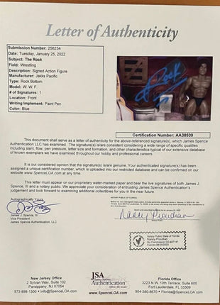 The Rock signed WWF Rock Bottom Action Figure in Display Case (w/ JSA)