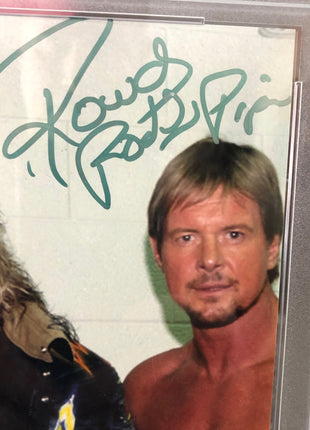 Rowdy Roddy Piper, Diamond Dallas Page & Bill Goldberg triple signed 8x10 Photo (Encapsulated w/ PSA-DNA)