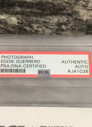 Eddie Guerrero signed 8x10 Photo (Encapsulated w/ PSA-DNA)