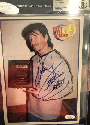 Eddie Guerrero signed 8x10 Photo (Encapsulated w/ JSA & Beckett)